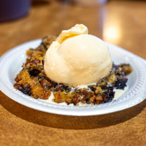 Bobby's Homestyle Cooking in Nederland, TX blueberry crunch dessert with ice cream