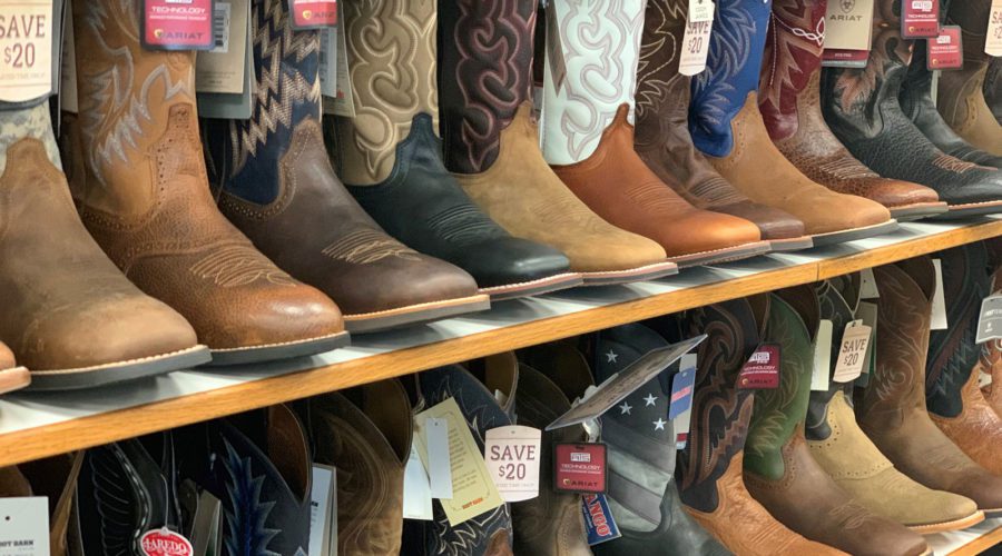 Row of boots on a shelf