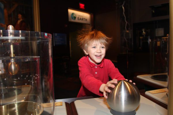 Child enjoying fun electricity experiment