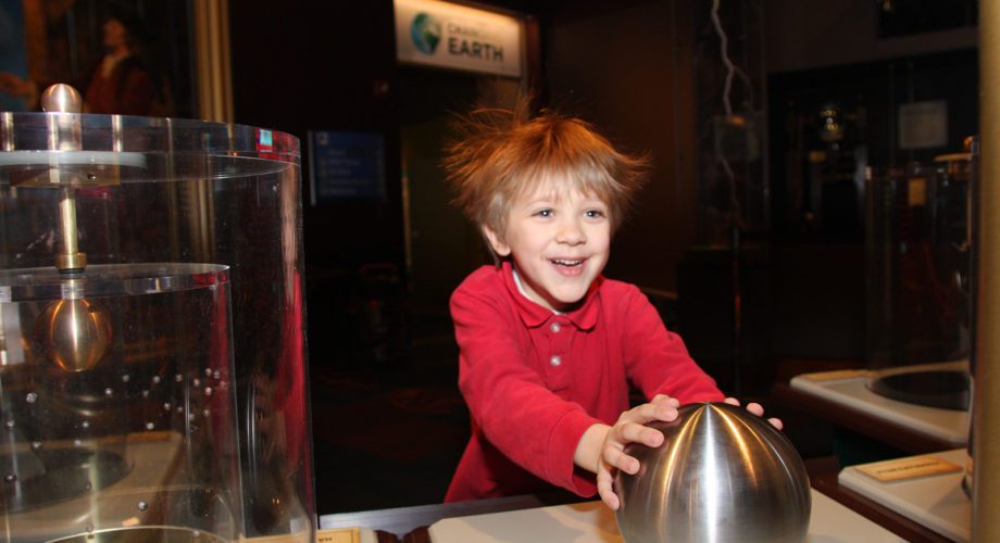 Child enjoying fun electricity experiment