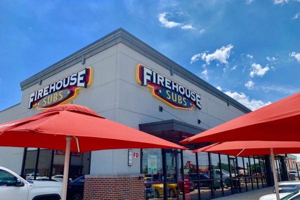 Firehouse Subs restaurant and Umbrellas and tables