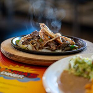 Marias Diner in Nederland and Groves TX Sizzling fajitas