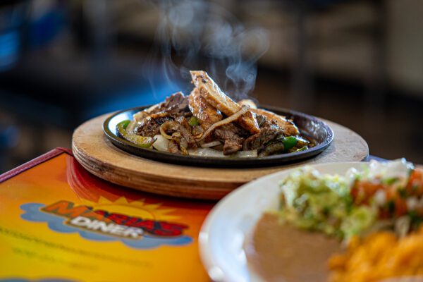 Marias Diner in Nederland and Groves TX Sizzling fajitas