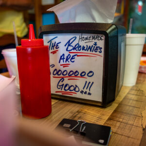 Sea Ranch Cafe in Port Neches, Tx advertisement on a napkin holder