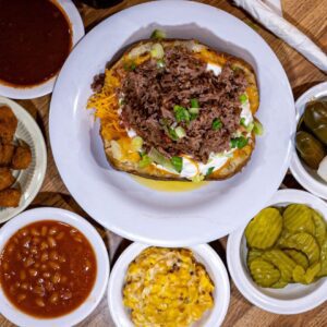 Tony's BBQ in SETX bbq stuffed potato with sides and fixings