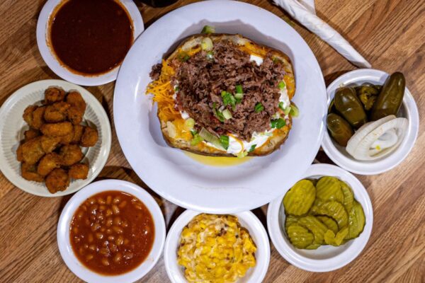 Tony's BBQ in SETX bbq stuffed potato with sides and fixings