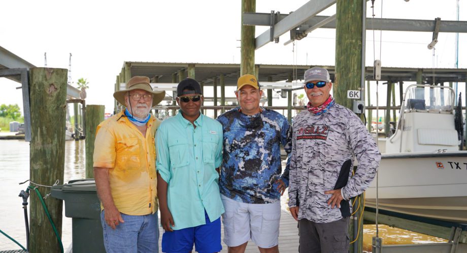 group of guys at a marina in port arthur, texas