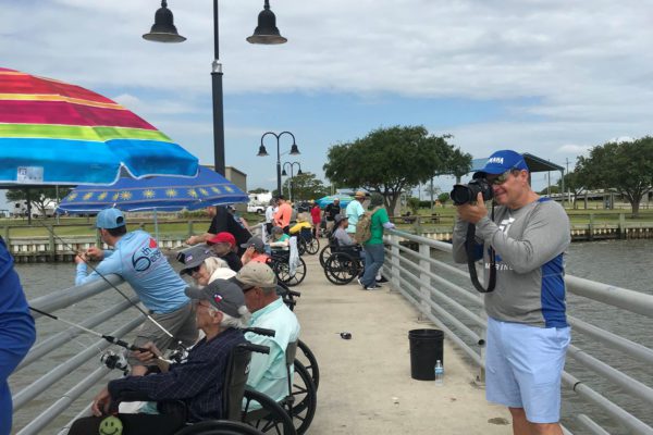 Seniors fishing off the pier
