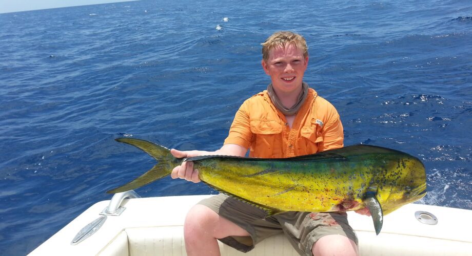 boy holding offshore fish in port arthur texas