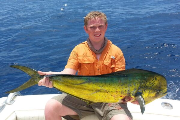 boy holding offshore fish in port arthur texas
