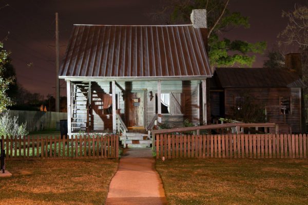night shot of the house of acadia
