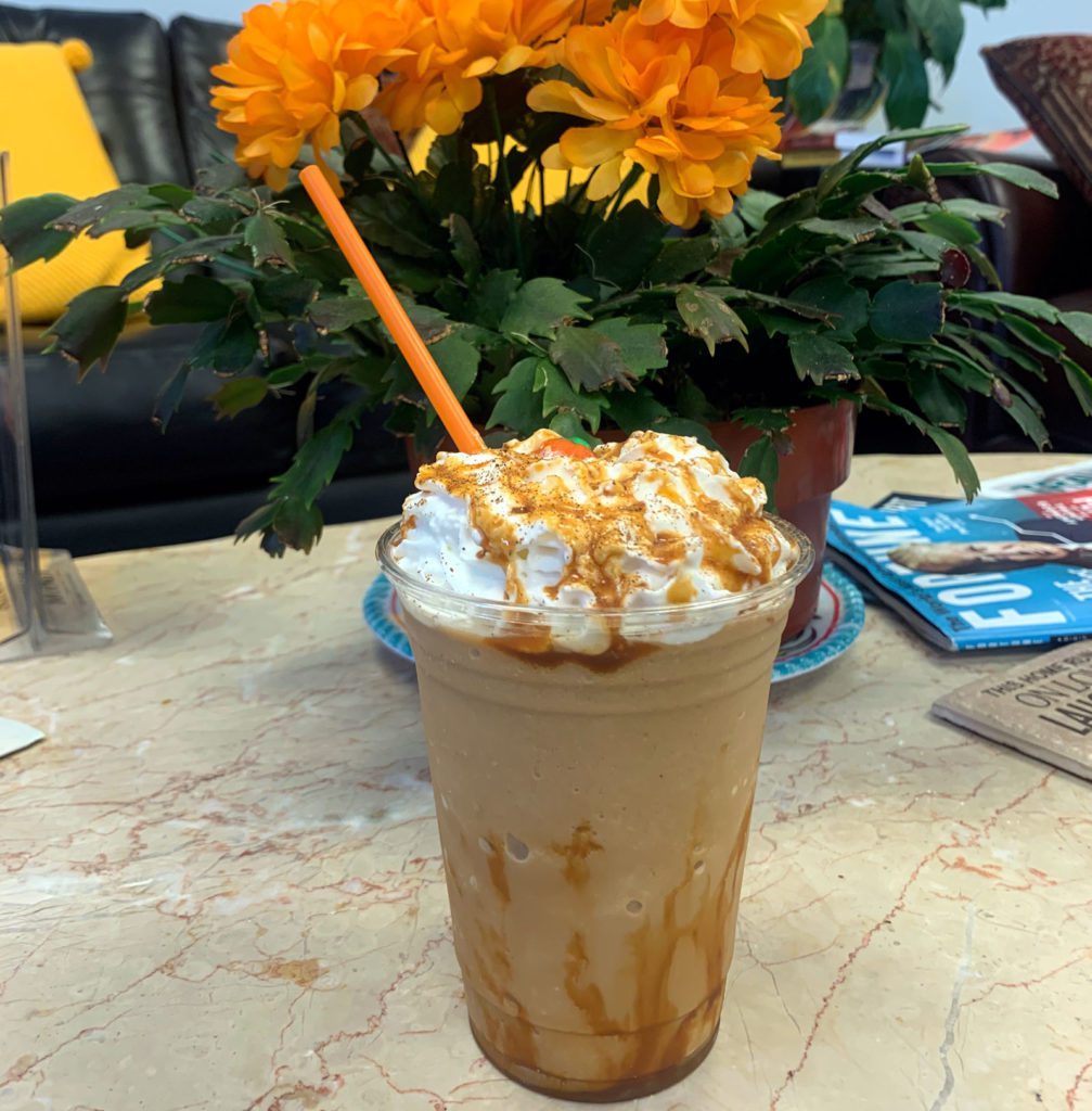 cold coffee and orange flowers