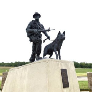 soldier and dog sculpture