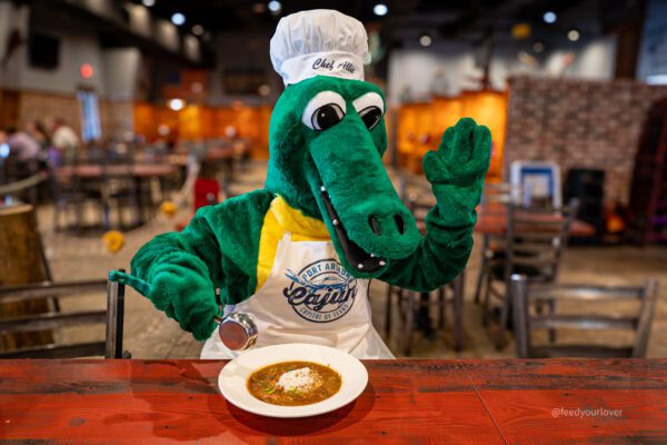 alliegator eating gumbo at a local restaurant in port arthur texas