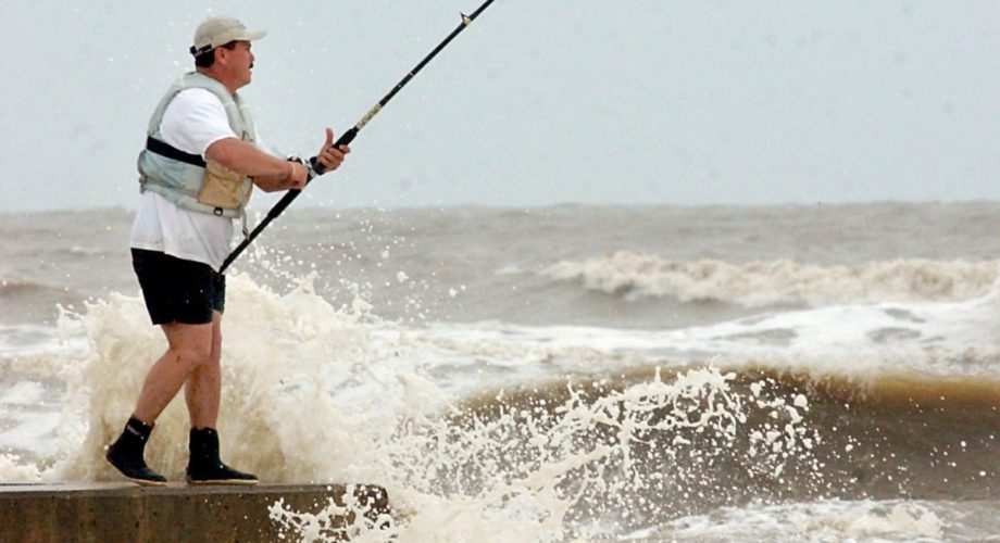 man fishing the jetties in port arthur texas
