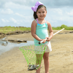 little girl crabbing at sea rim state park in port arthur