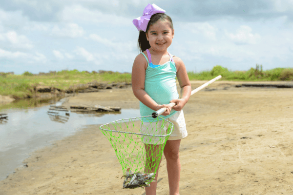 little girl crabbing at sea rim state park in port arthur