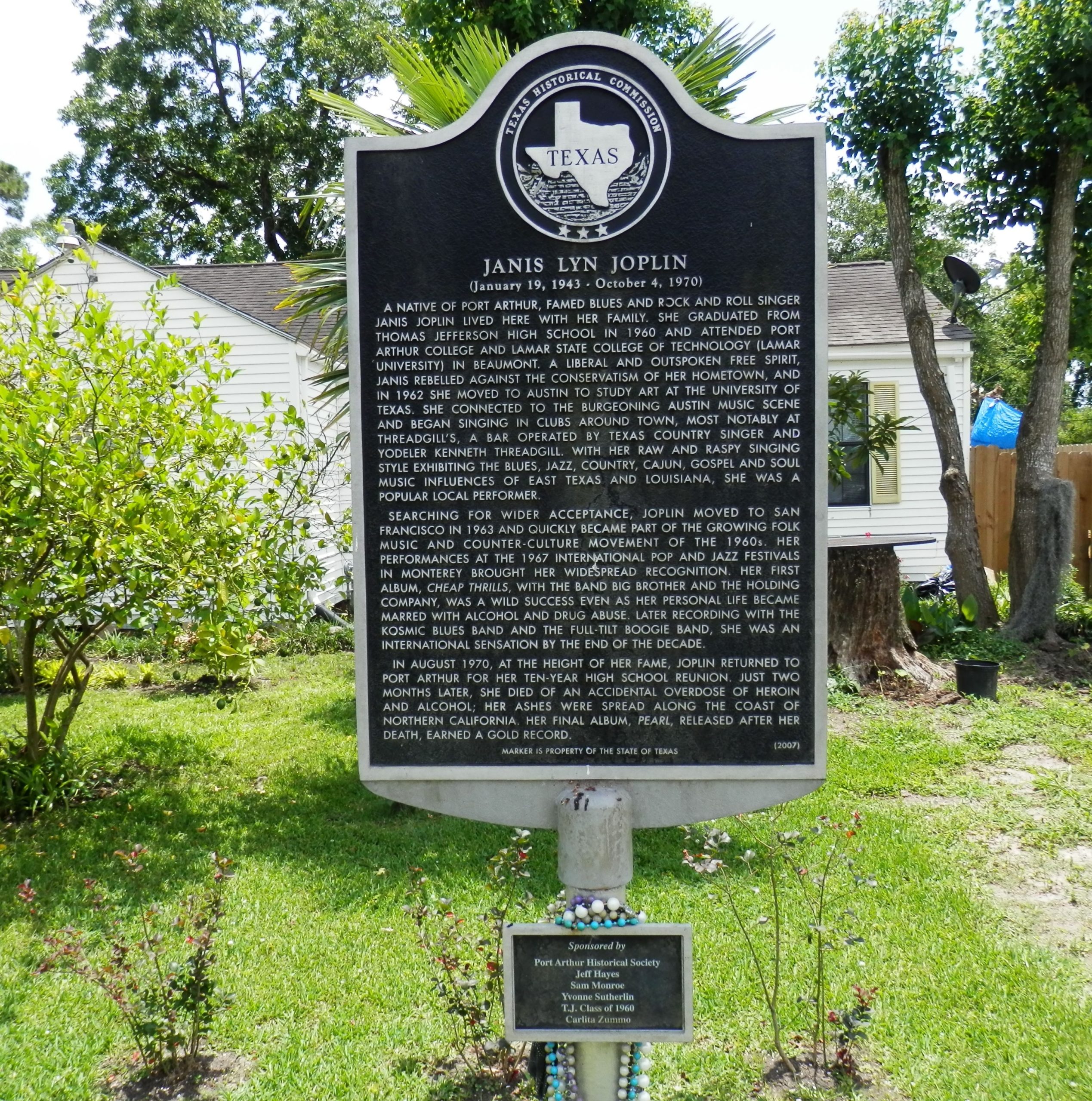 Janis Joplin's historical marker at her childhood home in Port Arthur, Texas
