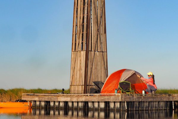 girl camping on the floating platform at sea rim state park in port arthur texas