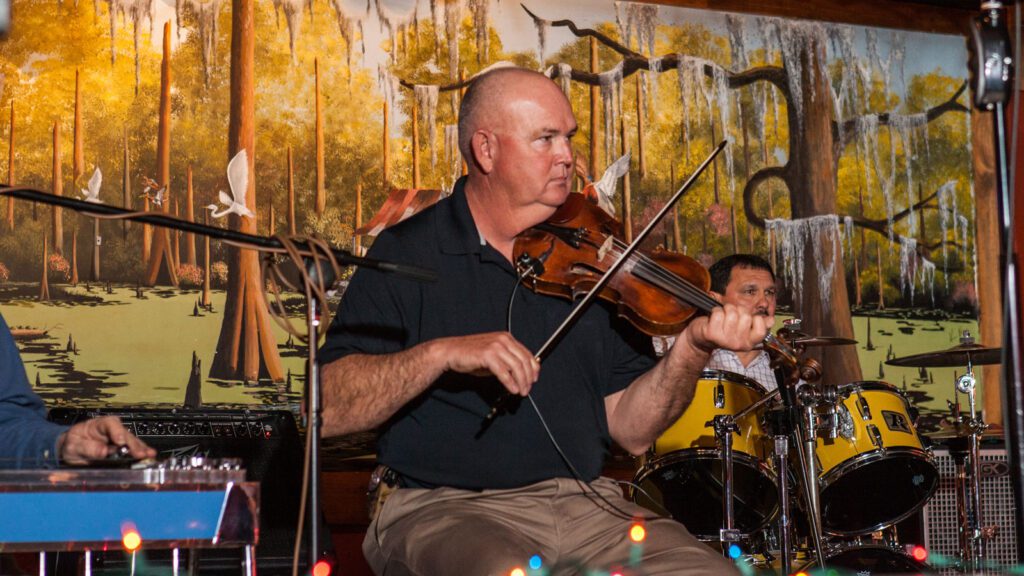cajun fiddle player in port arthur performing at a local restaurant