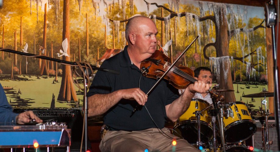 cajun fiddle player in port arthur performing at a local restaurant