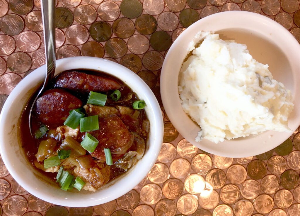 Gumbo and potato salad at The Feed Store. Photo courtesy of Lauren Bebeau.