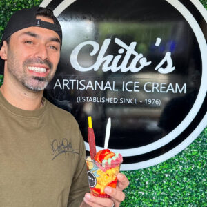 Chito's Artisanal Ice Cream in Port Arthur, TX worker smiles with deserts