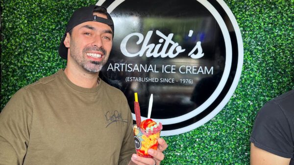 Chito's Artisanal Ice Cream in Port Arthur, TX worker smiles with deserts