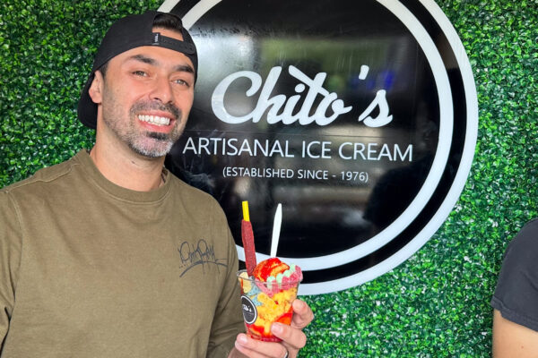 Chito's Artisanal Ice Cream in Port Arthur, TX worker smiles with deserts