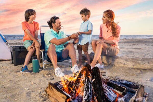 family campfire on the beach in port arthur hero homepage image