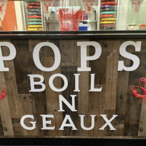 Pops Boil N Geaux sign in restaurant