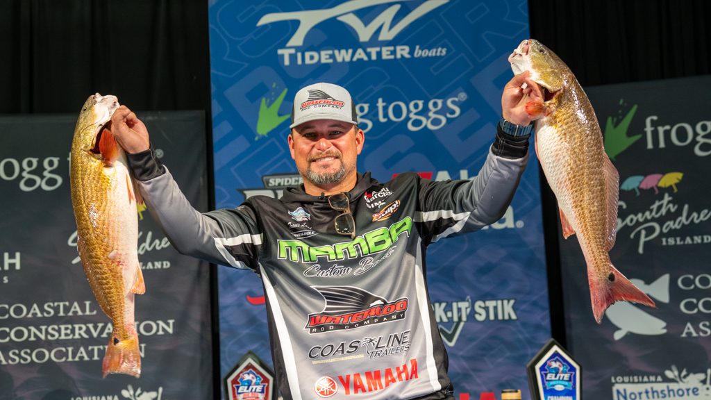 elite fishing series tournament weigh in Port Arthur texas, travis land holds up monster redfish