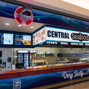 front of central seafood with counter and menu