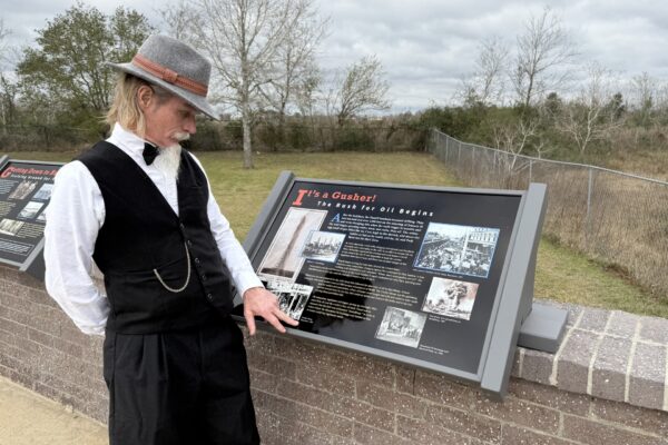 Spindletop Park viewing platform 125 anniversary, Big Thicket Outlaws reenactor by It's a Gusher panel