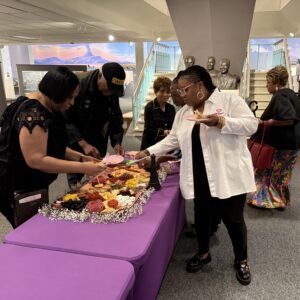 MOGC women enjoying charcuterie in hall